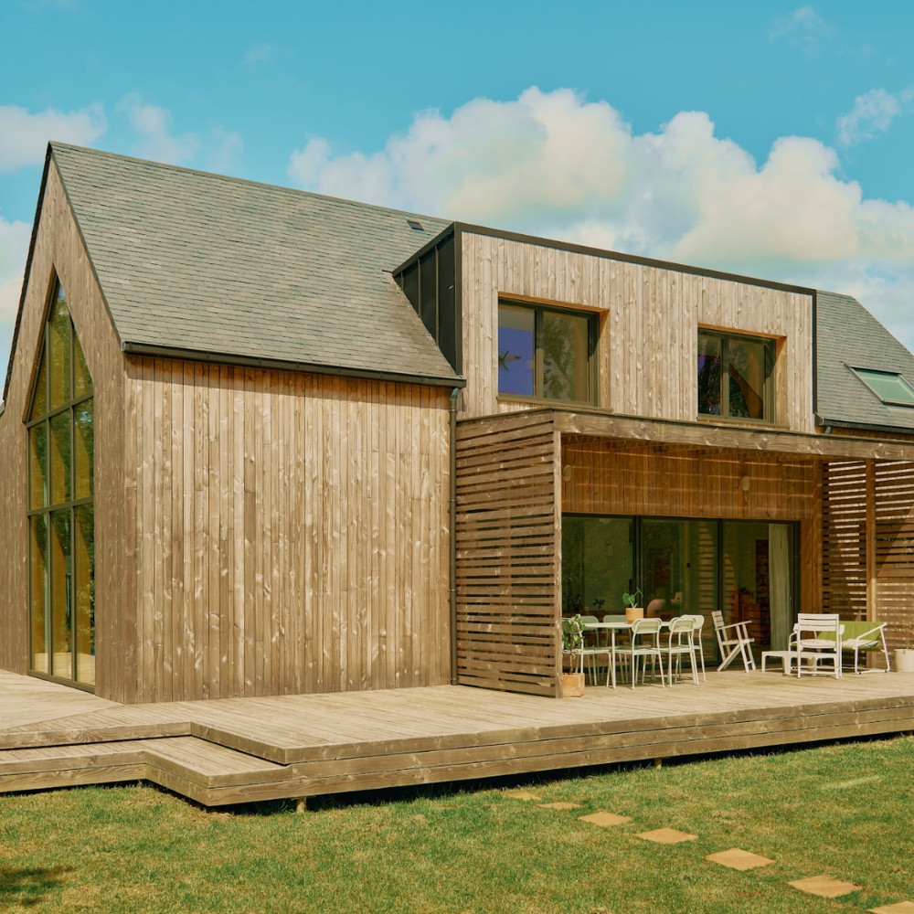 Maison ossature bois avec grandes baies vitrées et bardage douglas pré-grisé – Woodewood Finistère